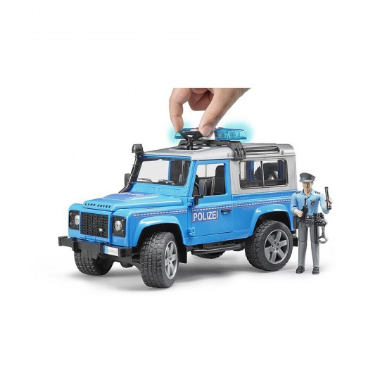 Masina de politie Land Rover Defender cu politist si accesorii Bruder