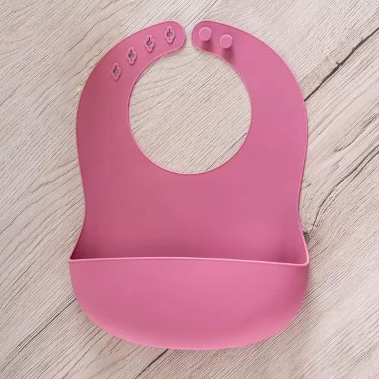 Bavetica din silicon moale cu buzunar colector pentru bebelusi, reglabila, roz, Reer Eat`n Tidy Bavetica din silicon moale cu buzunar colector pentru bebelusi, reglabila, roz, Reer Eat`n Tidy