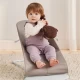 Balansoar bebelusi BabyBjorn Bliss Sand Gray cu aspect delicat de petal si  tesatura matlasata