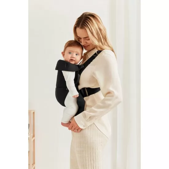 Marsupiu anatomic Mini cu pozitii multiple de purtare Black BabyBjorn Marsupiu anatomic Mini cu pozitii multiple de purtare Black BabyBjorn