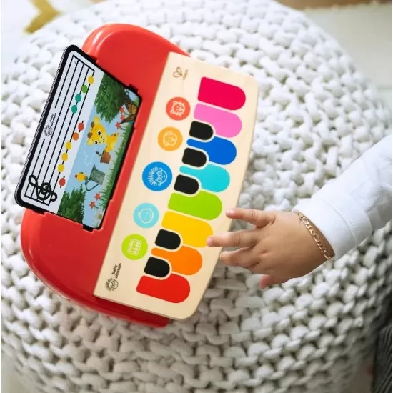 Jucarie muzicala de lemn Cal’s First Melodies Magic Touch Piano Baby Einstein