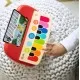 Jucarie muzicala de lemn Cal’s First Melodies Magic Touch Piano Baby Einstein