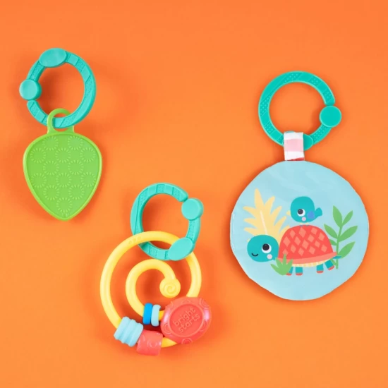 Salteluta de joaca cu bara de jucarii Tiki Toy Bar Bright Starts Salteluta de joaca cu bara de jucarii Tiki Toy Bar Bright Starts