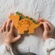Puzzle dinozaur din lemn Stegosaurus Orange Tree Toys 4 piese Puzzle dinozaur din lemn Stegosaurus Orange Tree Toys 4 piese