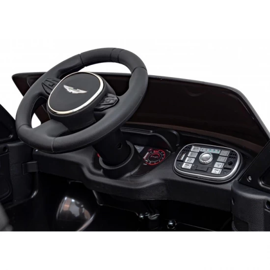 Masinuta electrica cu telecomanda Aston Martin DBX, roti EVA, scaun tapitat, 105x62x48 cm, putere 100W - Negru Masinuta electrica cu telecomanda Aston Martin DBX, roti EVA, scaun tapitat, 105x62x48 cm, putere 100W - Negru