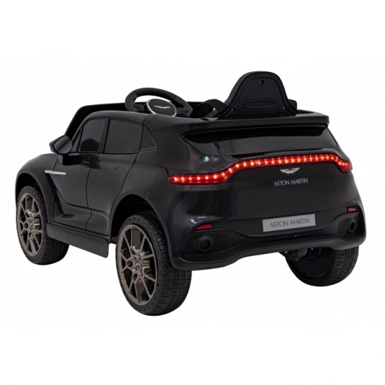 Masinuta electrica cu telecomanda Aston Martin DBX, roti EVA, scaun tapitat, 105x62x48 cm, putere 100W - Negru Masinuta electrica cu telecomanda Aston Martin DBX, roti EVA, scaun tapitat, 105x62x48 cm, putere 100W - Negru