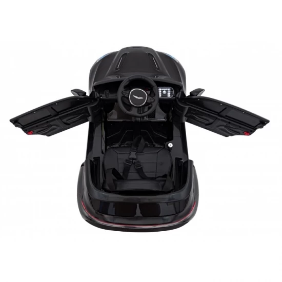 Masinuta electrica cu telecomanda Aston Martin DBX, roti EVA, scaun tapitat, 105x62x48 cm, putere 100W - Negru Masinuta electrica cu telecomanda Aston Martin DBX, roti EVA, scaun tapitat, 105x62x48 cm, putere 100W - Negru