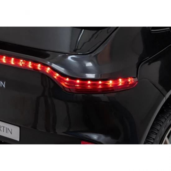 Masinuta electrica cu telecomanda Aston Martin DBX, roti EVA, scaun tapitat, 105x62x48 cm, putere 100W - Negru Masinuta electrica cu telecomanda Aston Martin DBX, roti EVA, scaun tapitat, 105x62x48 cm, putere 100W - Negru