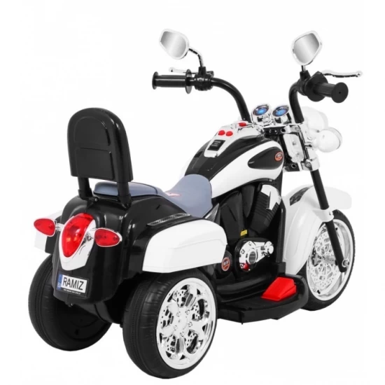 Motocicleta electrica Chopper NightBike TR1501, roti si scaun din plastic, 92x34x63 cm, putere 6V - Alb Motocicleta electrica Chopper NightBike TR1501, roti si scaun din plastic, 92x34x63 cm, putere 6V - Alb