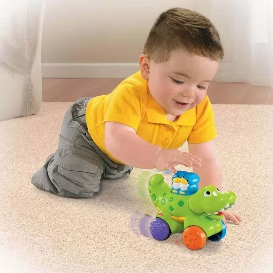 Jucarie bebe Fisher Price Press and Go Crocodil Jucarie bebe Fisher Price Press and Go Crocodil