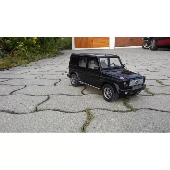 Masina cu telecomanda Mercedes-Benz G55 negru cu scara 1:24 Masina cu telecomanda Mercedes-Benz G55 negru cu scara 1:24