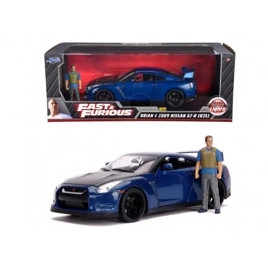 Masinuta metalica cu figurina Fast and Furious Nissan Skyline scara 1:18