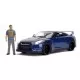 Masinuta metalica cu figurina Fast and Furious Nissan Skyline scara 1:18