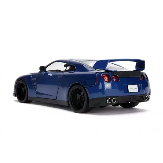 Masinuta metalica cu figurina Fast and Furious Nissan Skyline scara 1:18