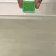Jucarie senzoriala luminoasa pentru baie Pippa Glo Pal verde Jucarie senzoriala luminoasa pentru baie Pippa Glo Pal verde