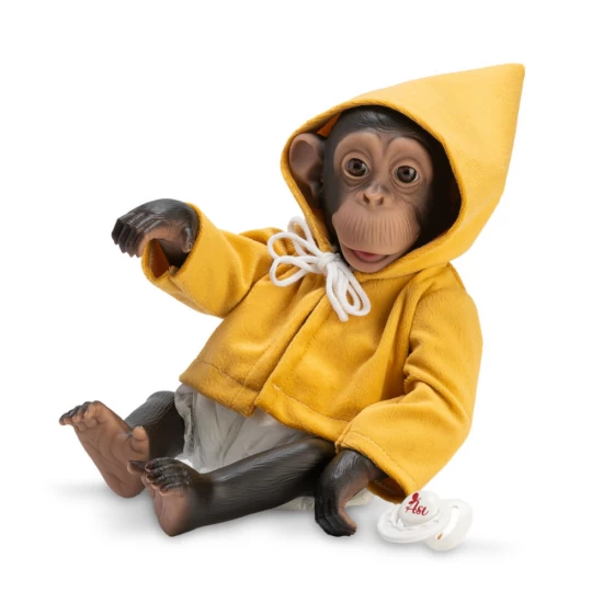Figurina Maimutica Reborn cu scutec, hainuta cu gluga galbena si suzeta