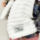 Papusa Nines D'Onil Joy cu parul blond, vesta alba, miros de vanilie, 37 cm Papusa Nines D'Onil Joy cu parul blond, vesta alba, miros de vanilie, 37 cm